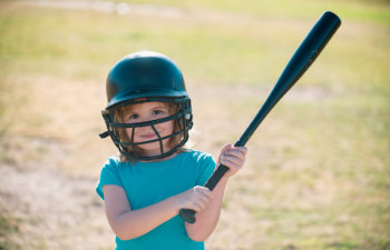 kid-holding-a-baseball-bat